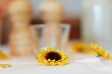 Closeup shot of a decorative sunflower on a table