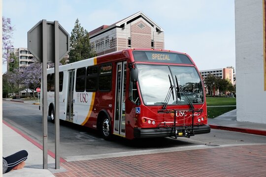 Closeup shot of a USC school bus parked in the campus in Los Angeles, California