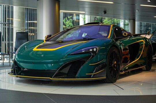McLaren 688HS finished in MSO nonmetallic racing green parked in a store