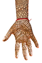 bride's hand painted with mehndi isolated on white background