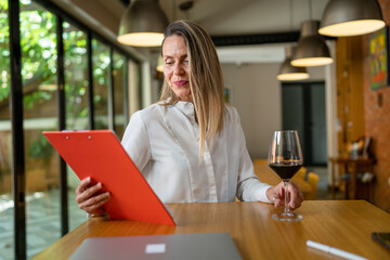 woman female enologist wine quality check at winery