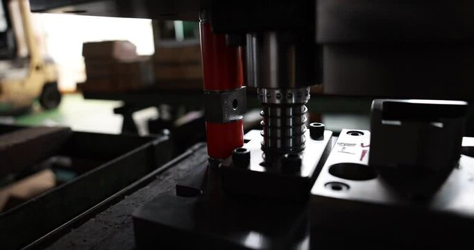 Sheet Metal Stamping Tool Die for Automotive Precision Parts on The Numerical Control Milling Machine Table. Tandem Stamping System. At a High Quality Technology Factory. Slow motion 4K video.