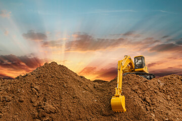 Selective focus ,Crawler excavator with Bucket lift up are digging the soil in the construction...