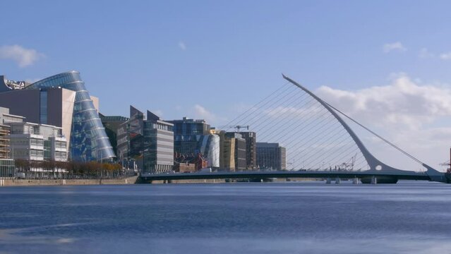 Samuel Beckett Bridge Over The River Liffey With The Convention Centre In Dublin, Ireland. - timelapse