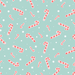 Hand drawn candy cane seamless pattern on teal background