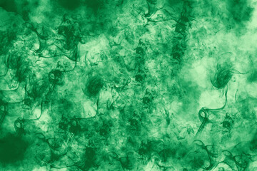 Green color smoke  design abstract on black background, darkness concept pattern