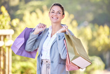 Retail, shopping bag and happy with portrait of woman spending for luxury, sales and fashion spree....