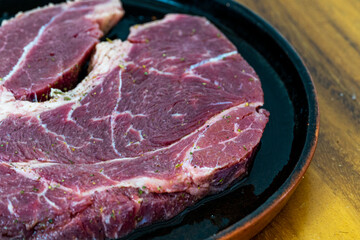 dish with raw meat about to be prepared and marinated for cooking, mexico