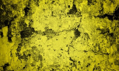 cracked wall background with dark sided yellow coloring, old wall graffiti with crack art, peeling wall surface with scratches on old wall