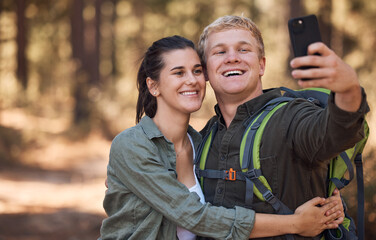 Couple, phone selfie and hiking in nature on holiday or summer vacation. Travel, man and woman enjoying quality time together with 5g mobile smartphone on social media, picture post or happy memory.