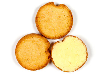 Three round toasts on a white background. Toasted sponge cakes close-up.