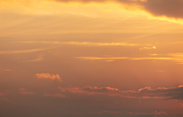 Colorful clouds at sunset as background.