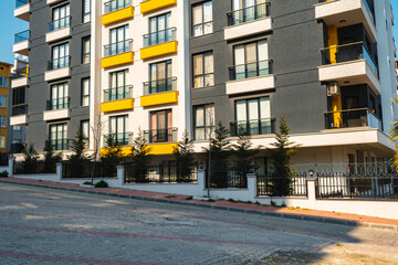 Obraz premium New apartment building with colorful facade and street in Istanbul