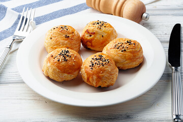 Homemade turkish piesl pogaca with sesame seeds