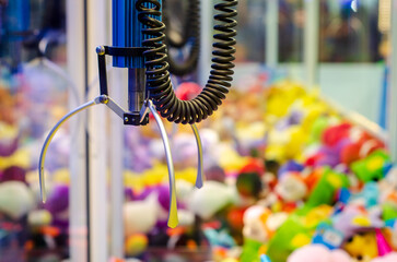 A claw crane game machine with toys