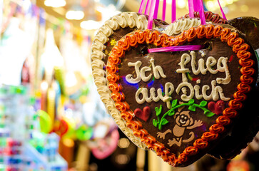 Gingerbread Hearts at German Christmas Market. I fly on you - inscription in German