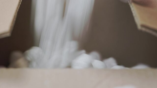White polystyrene foam in cardboard box