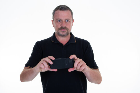 Handsome Middle Aged Man Writing Looking Screen Cell Phone Screen On White Background