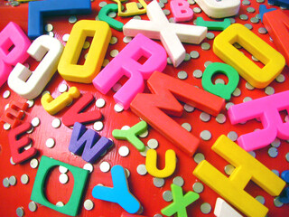 Fototapeta premium Closeup of toy magnets with alphabet