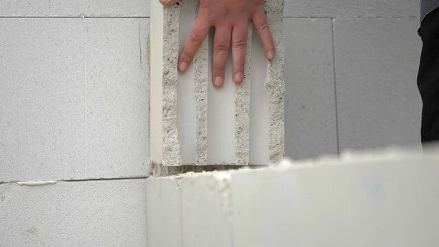 Laying Sand-Lime Brick With Lime Mortar. Bricklaying Masonry. slow motion