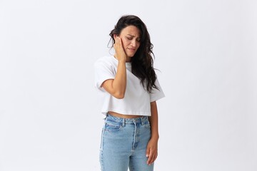 Woman sadness pain in the neck, back and head, spasms and diseases at a young age, white background, copy space