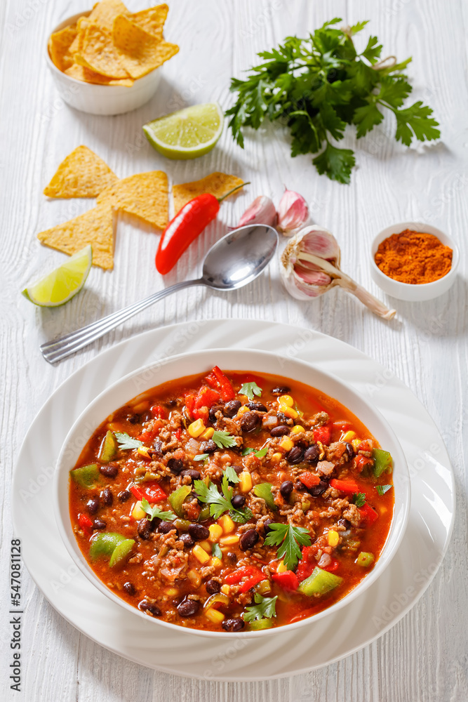 Sticker taco soup of ground beef, corn, beans and veggies