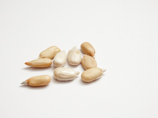 Seed of Sunflower isolated on white background. Close-up of delicious sunflower black seeds, isolated on white background