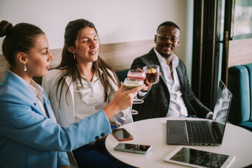 Business colleagues making cheers