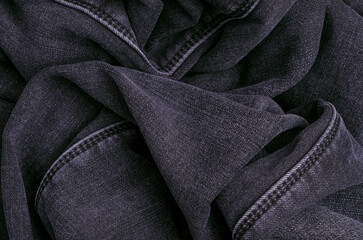 Part of dark jeans.