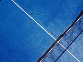 Blue padel tennis court, image with drone. Top view