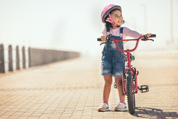 Fun, thinking and girl cycling with a bike in the city for sustainability, carbon footprint and eco...