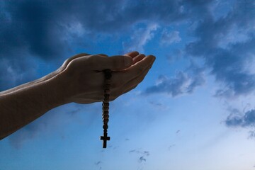 Human hands of prayer folded, religion concept