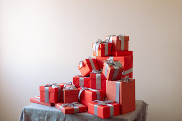 a mountain of gifts on the table