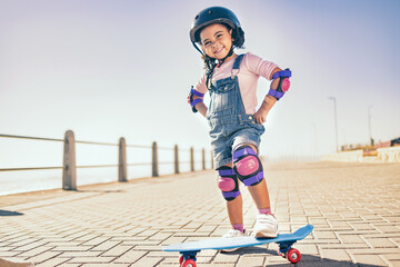 Summer, happy and little girl portrait with skateboard for holiday in Los Angeles with sky mockup....
