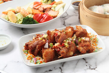 Freshly cooked garlic butter crispy fried pork