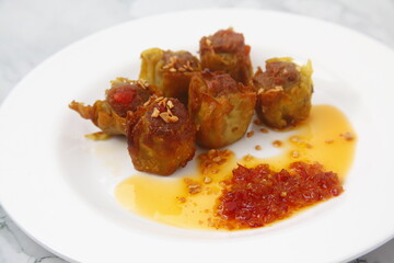 Freshly cooked fried pork siomai or dumpling