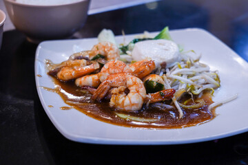 Teppanyaki, Tepenyaki, Tepanyaki, Grilled Shrimp, meat, with sauce seasoning and mustard greens, bean sprouts on a plate, Japanese and Korean Grill