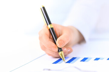 Naklejka premium close up. businessman checking the financial schedule.