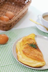 Delicious homemade Cheese Omelet on table, breakfast table.