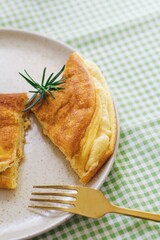 Delicious homemade Cheese Omelet on table, breakfast table.