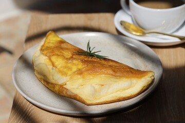 Delicious homemade Cheese Omelet on table, breakfast table.
