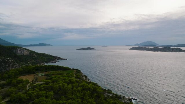 Aerial view from Rhodes western coastline of islets in Aegean Sea at sunset