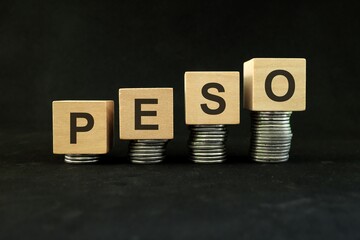 Peso currency, economic and financial growth and recovery concept. Increasing stack of coins in...