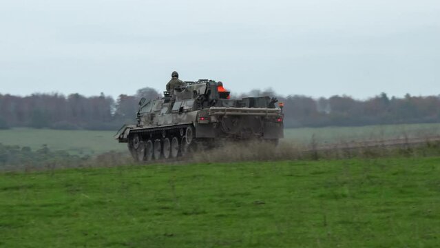 British Army Challenger Armored Repair and Recovery Vehicle (CRARRV) in action on a military battle training exercise, Wilts UK