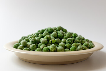 green peas on a white background