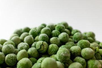 green peas on a white background