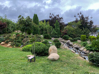 a cozy garden with green plants and a stream in Turkey. High quality photo