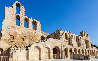 Fototapeta premium Historic Landmark, Odeon of Herodes Atticus, in the Acropolis of Athens, Greece. Sunny Day
