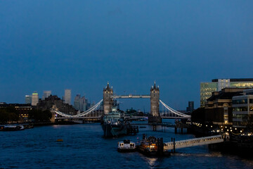 Fototapeta na wymiar Thames by night - view over the river Thames in London, with tower bridge in sight
