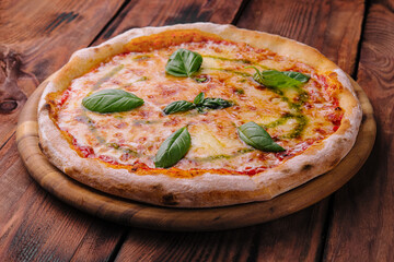 Homemade Pizza Italian margherita on wood
